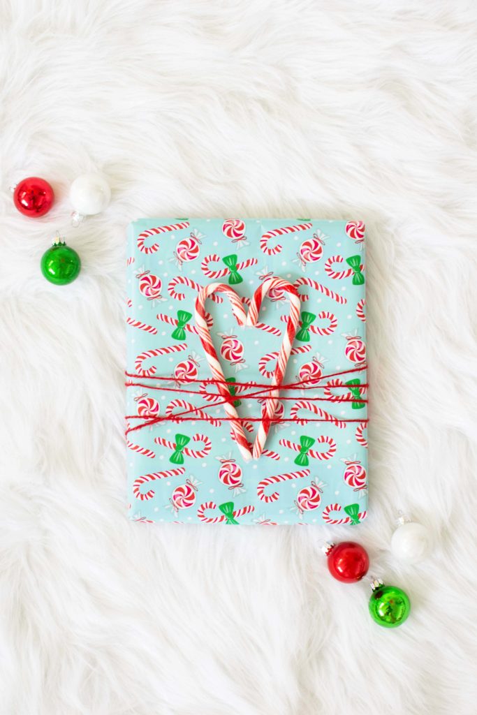 Steal These Holiday Gift Wrapping Ideas Diy Candy Cane Themed Paper